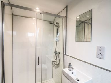 A bathroom with a shower and sink at Thomas Chambers in Camborne