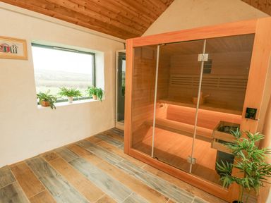 A sauna with a window and plants at 2 Trem Y Mor in Llanfwrog near Llanfachraeth