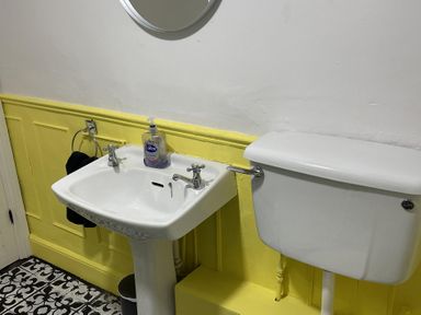 A bathroom with a sink and toilet at High Dyke Cottage