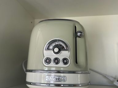 A toaster on a shelf at Y Nyth in 