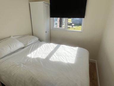 A bedroom with a bed and a window at Embury