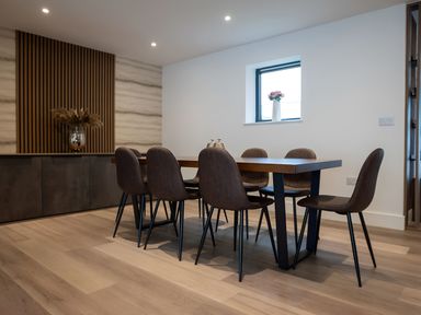 A dining area with a table and chairs at The Galloway in Morpeth