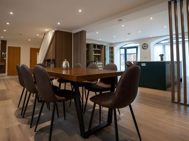 A dining room with a table and chairs at The Galloway in Morpeth