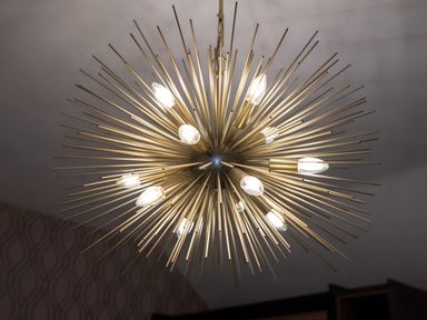 A chandelier with multiple bulbs at The Galloway in Morpeth