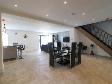 A dining room with a table and chairs at The Gavel in Morpeth