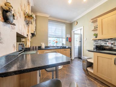 A kitchen with a counter and various appliances at Sea View Escape in Penmaenmawr