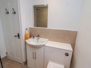 A bathroom with a sink and toilet at 1 Sunnybrae in Alnwick