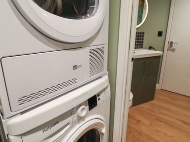 A laundry room with washer and dryer at Unit 1 Ipswich