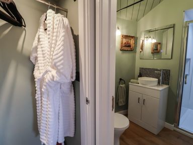 A bathroom with a sink and shower at Unit 1 in Ipswich