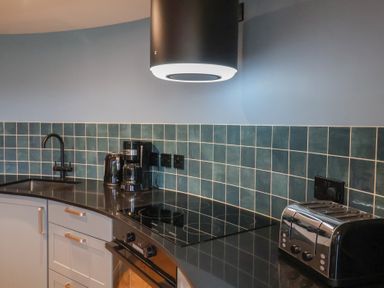 A kitchen with a sink and appliances at Unit 2 in Ipswich