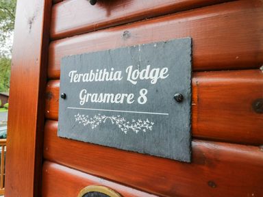 A nameplate indicating Terabithia Lodge Grasmere 8 at Terabithia Lodge in Troutbeck