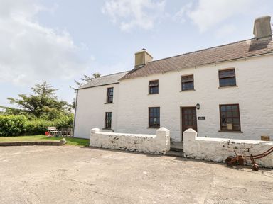 A house with garden furniture at Ty Fferm Newport
