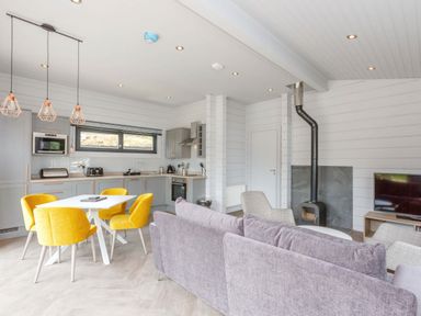 A living room with kitchen area at Leyburn (Pet) in Leyburn