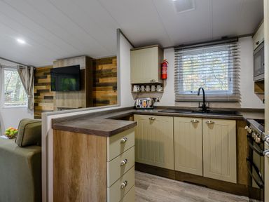 A kitchen with appliances and cabinets at Alford Spa in Louth