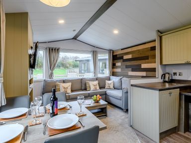 A living room with a sofa and dining table at Alford WF in Louth