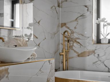 A bathroom with a sink and bathtub at Heddfan in Carmarthen