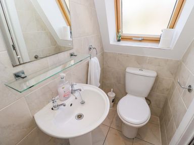 A bathroom with a sink and toilet at Lady Of Lourdes in Whitchurch, Herefordshire