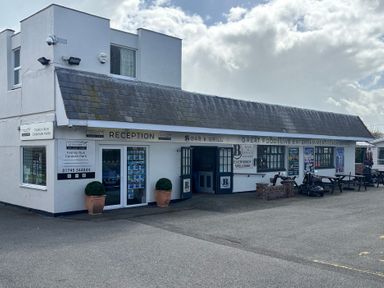A reception area of a bar and grill at The Beachside Hideout - St Michaels and Browns Caravan Park Towyn