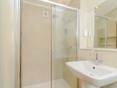 A bathroom with a shower and sink at The Chesterton in Kings Cliffe