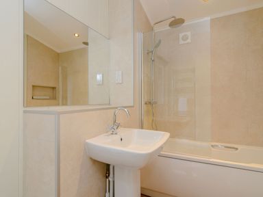 A bathroom with a sink and shower at The Chesterton in Kings Cliffe
