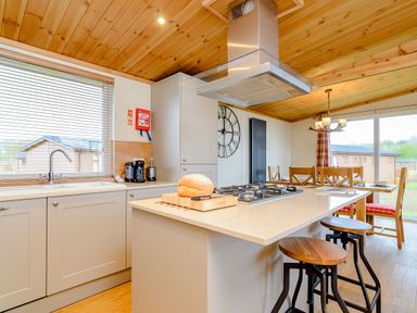 A kitchen with a countertop and stove at The Wansford in Kings Cliffe