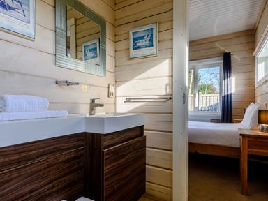 A bathroom with a sink and mirror at Chestnut Spa (Pet) Carlton Miniott near Thirsk
