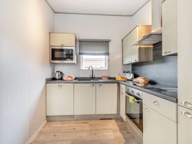 A kitchen with countertops and appliances at Kinder Spa Carlton Miniott near Thirsk
