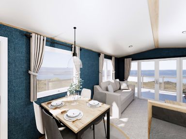 A dining room with a table and chairs at Willow Waterside Spa Carlton Miniott near Thirsk