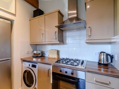 A kitchen area with appliances and fixtures at Cherry Tree in Carlton Miniott near Thirsk