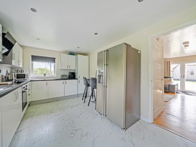 A kitchen with modern appliances and counter at Charcoal Lodge in Brigg