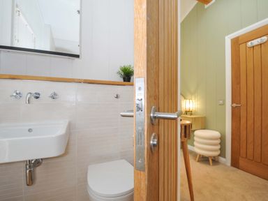 A bathroom with a sink and toilet at 6 Stonerush Valley Looe