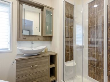 A bathroom with a sink and shower at Helvellyn (Pet) Penrith