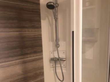 A shower with a handheld showerhead at 62 Guddlebeck, Lakeland Leisure Park, Flookburgh