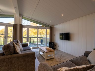 A living room with a sofa and coffee table at Wentworth in Waltham