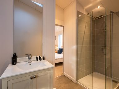 A bathroom with a sink and shower at Wentworth in Waltham