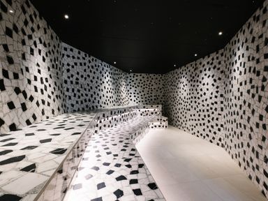A spa area with patterned black and white tiles at The Luxury Retreat in Waltham