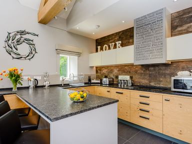 A kitchen with counter space and appliances at The View in Laugharne