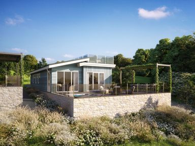 A house with a terrace and garden at Epic Spa in Laugharne