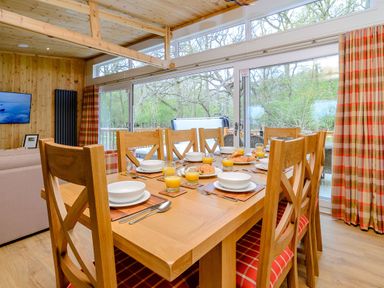A dining room with a table set for breakfast at The Fotheringhay in Kings Cliffe