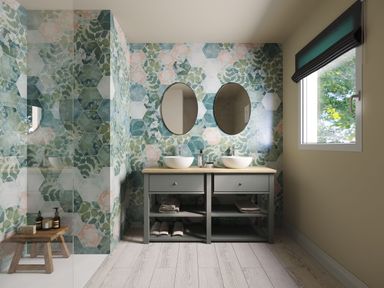 A bathroom with two sinks and mirrors at Heatherwood (Pet) in Slaley