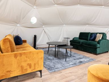 A snug with seating and a coffee table at The Dome (Pet) Great Ayton