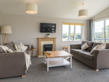 A living room with a sofa and coffee table at Greystone in Great Ayton