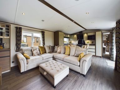 A living room with a sofa and coffee table at The Woods in Great Ayton