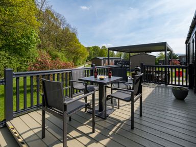A deck with a table and chairs at The Woods (Pet) Great Ayton