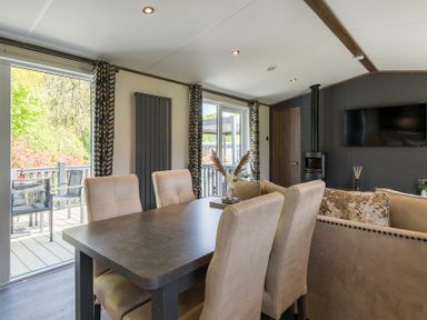 A dining room with chairs and a table at The Woods (Pet) Great Ayton