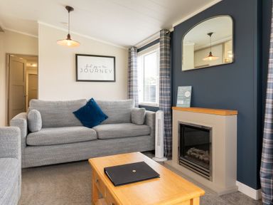 A living room with a sofa and a coffee table at Rosedale in Great Ayton