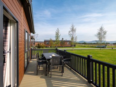 A deck with a table and chairs at Roseberry Great Ayton