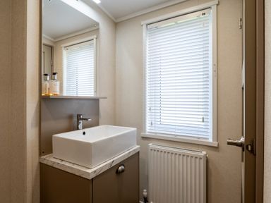 A bathroom with a sink and mirror at Roseberry in Great Ayton