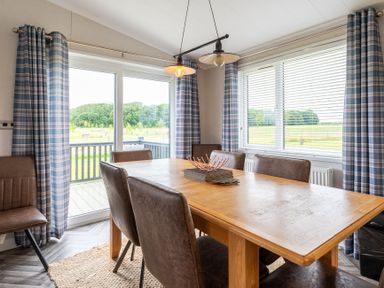 A dining room with a table and chairs at Roseberry in Great Ayton