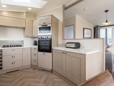A kitchen with appliances and cabinets at Roseberry (Pet) Great Ayton